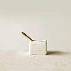 CREATIVE CO-OP White Marble Bowl W/ Brass Spoon